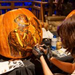 Giant pumpkins are carefully carved by hand at Carved © Kathryn Rapier