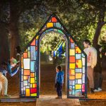 Psychic Village by Tom Fruin delights a family during Enchanted Forest of Light © Kathryn Rapier
