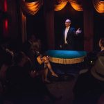 Tom Frank performs a classic coin manipulation trick at the Magic Castle. Photo by Taylor Wong