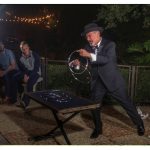 Tom Frank performs the linking rings trick at the Houdini Estate.